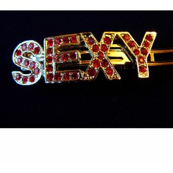 "SEXY" CRYSTAL BONE FUR BARETTE